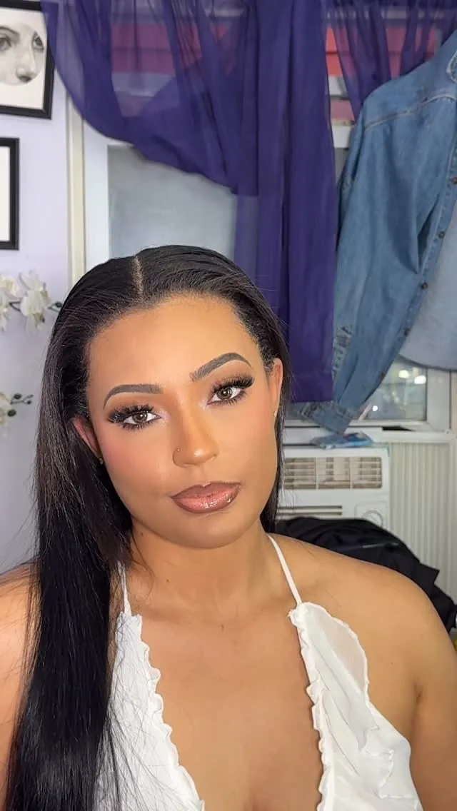 Soft glam makeup with lashes on a Tyca Beaute client