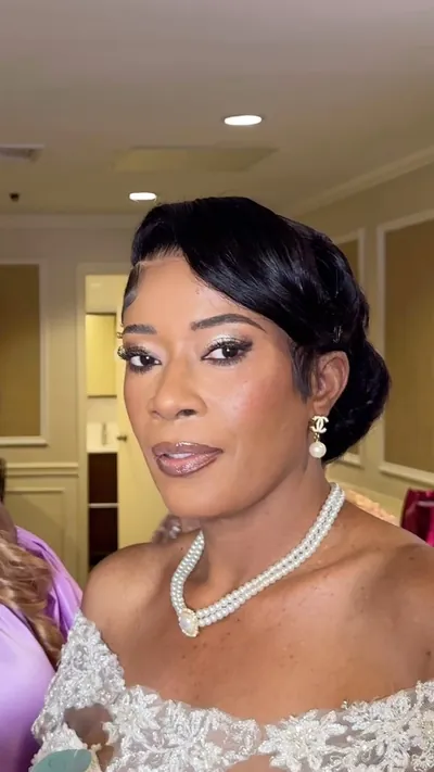 Bride in pearls after bridal glam by Tyca Beaute